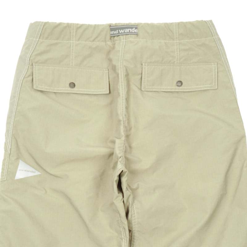 アンドワンダー　PERTEX nylon rip pants and wander PERTEX NYLON RIP PANTS - CAMEL | Garmentory