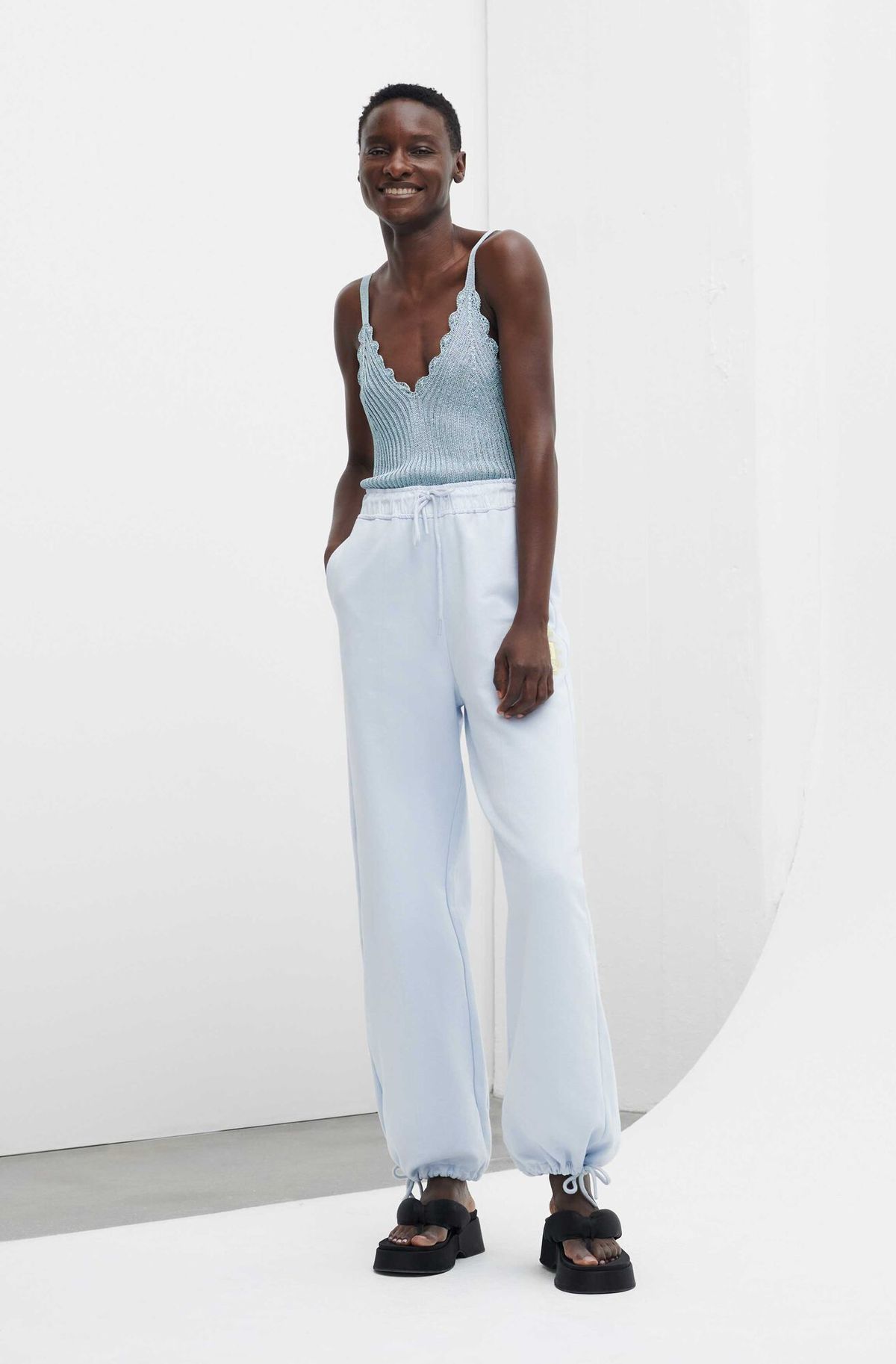 Sleeveless-Metallic-Knit-Top-