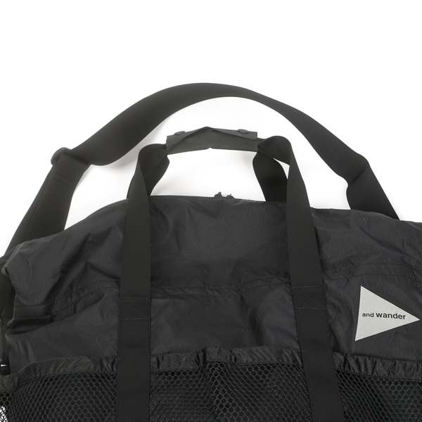 and wander X-PAC 45L TOTE BAG - BLACK | Garmentory