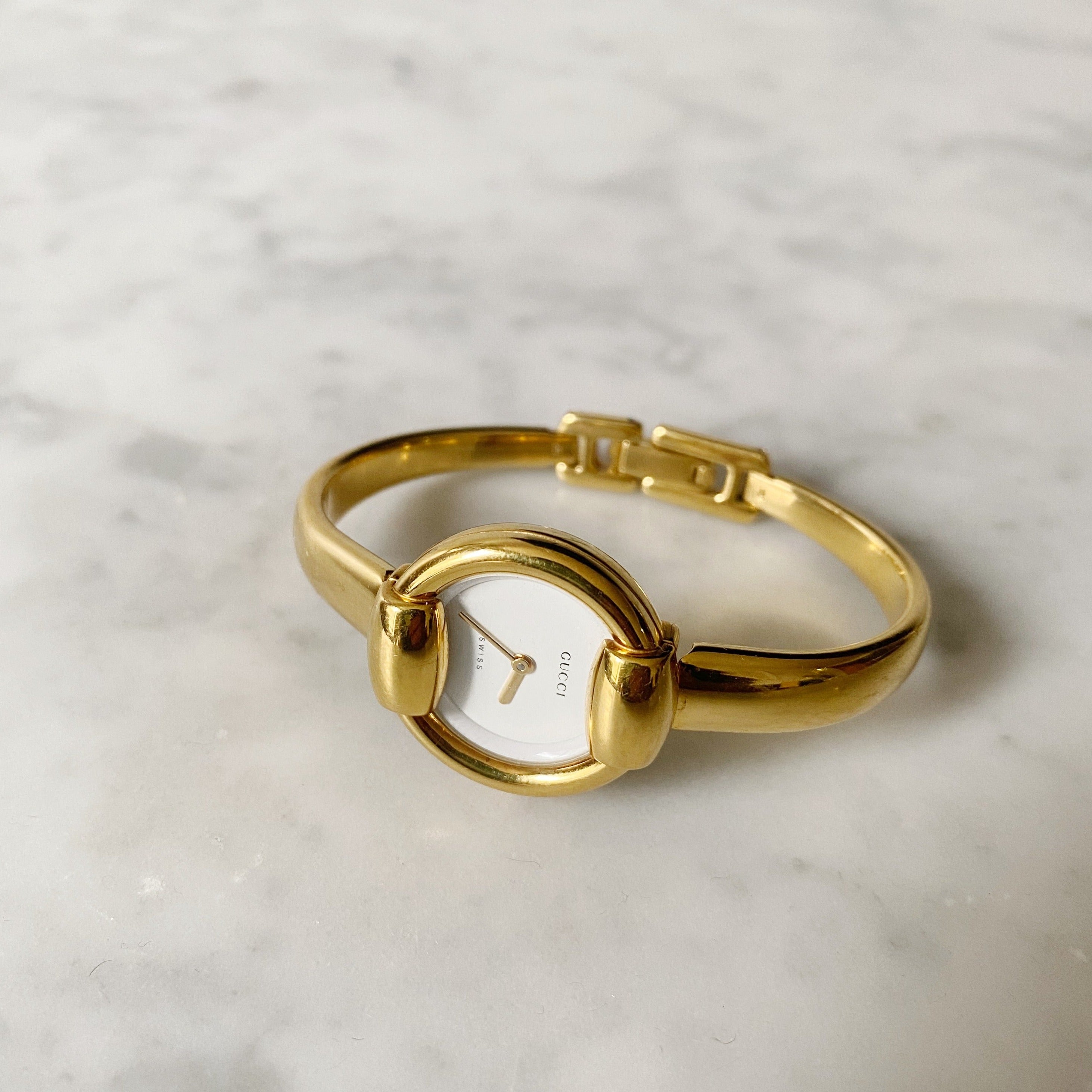 Vintage Gold Gucci Watch with Round Face | Garmentory