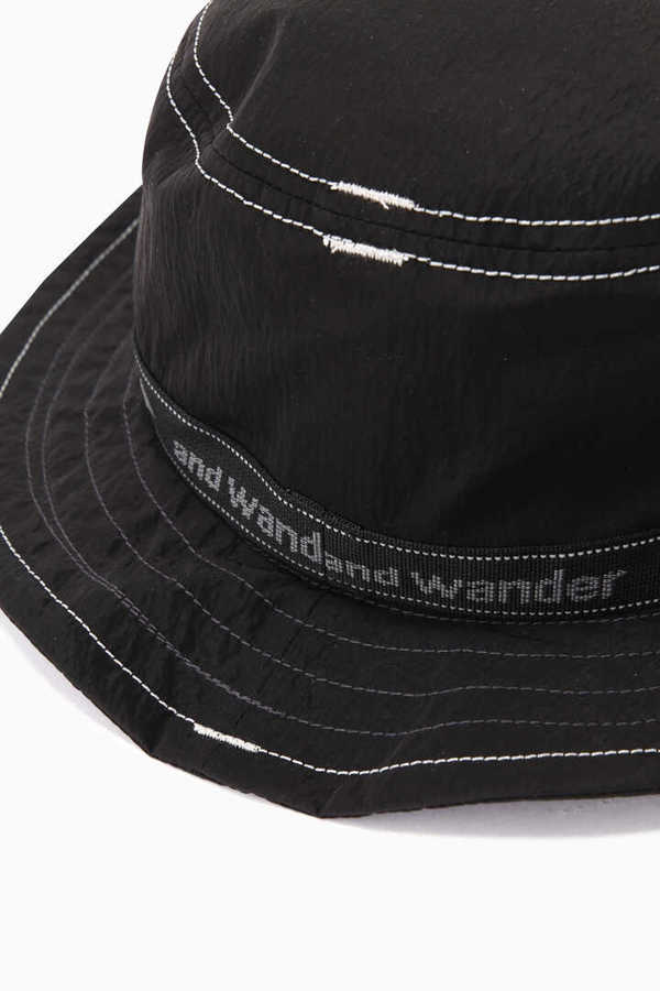 And Wander JQ Tape Hat- Black | Garmentory