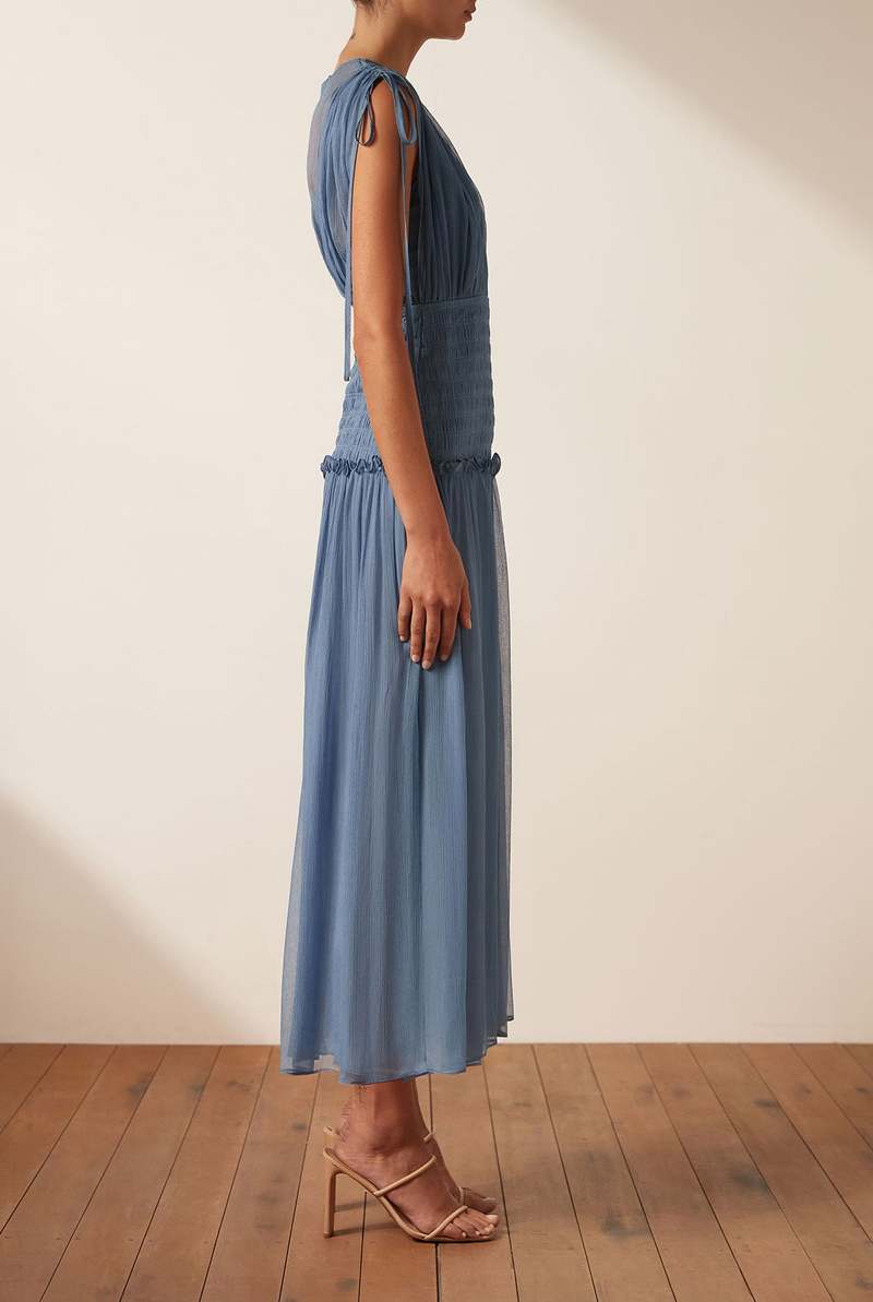 shona joy ruched midi dress Isola Enchant in tyrrhenian blue Isola. Shop the Strapless Ruched Midi Dress as seen on @mexiquer at the link in bio. #ShonaJoy