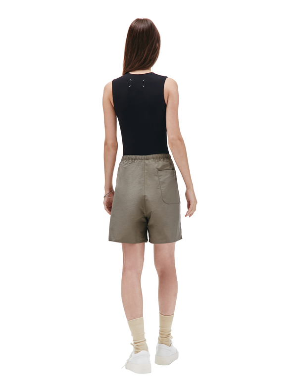 Fear of God Essentials Logo print nylon shorts - brown | Garmentory