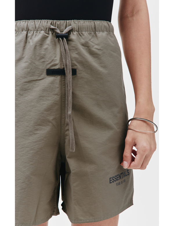 Fear of God Essentials Logo print nylon shorts - brown | Garmentory