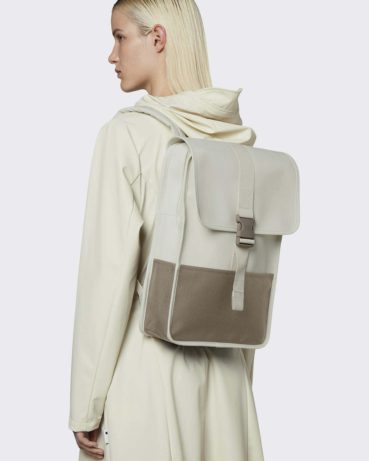 buckle backpack mini rains The comfortable handle and adjustable padded shoulder and chest straps ensure a pleasant carrying experience Rains Buckle Backpack Mini bag