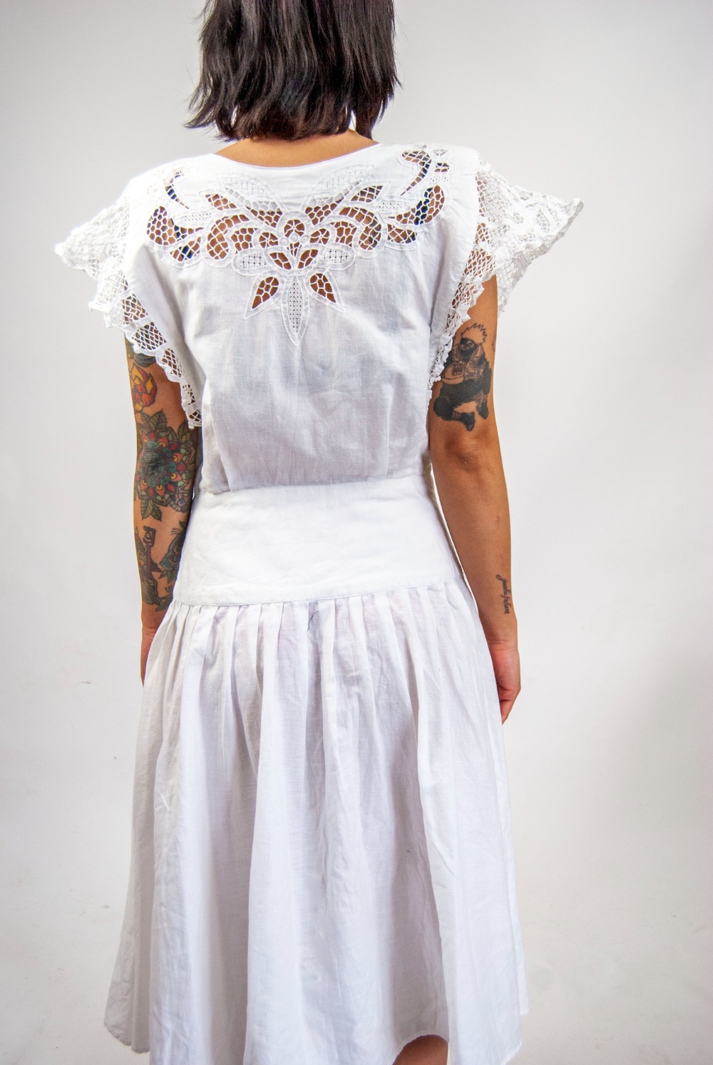 knee length dresses for ladies Ivory Sleeveless Ruffle Hem Drop Waist Mini Dress