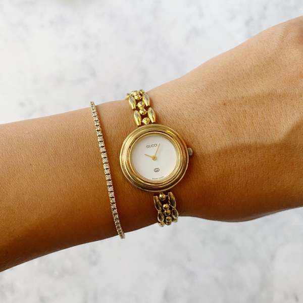 Tarin Thomas Vintage Gold Gucci Watch w/ White Face | Garmentory display picture 3
