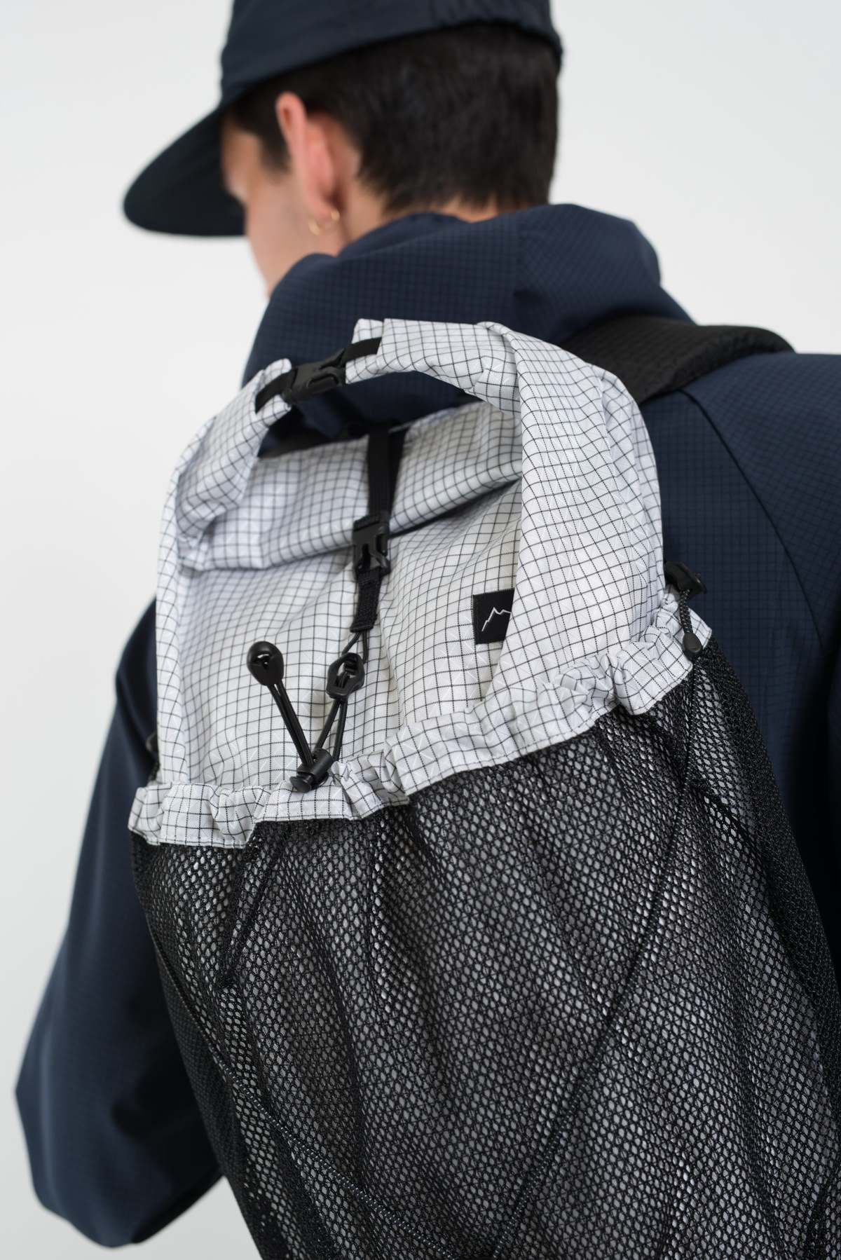 CAYL Gaya Roll Top Backpack - B-Grid Mesh White | Garmentory