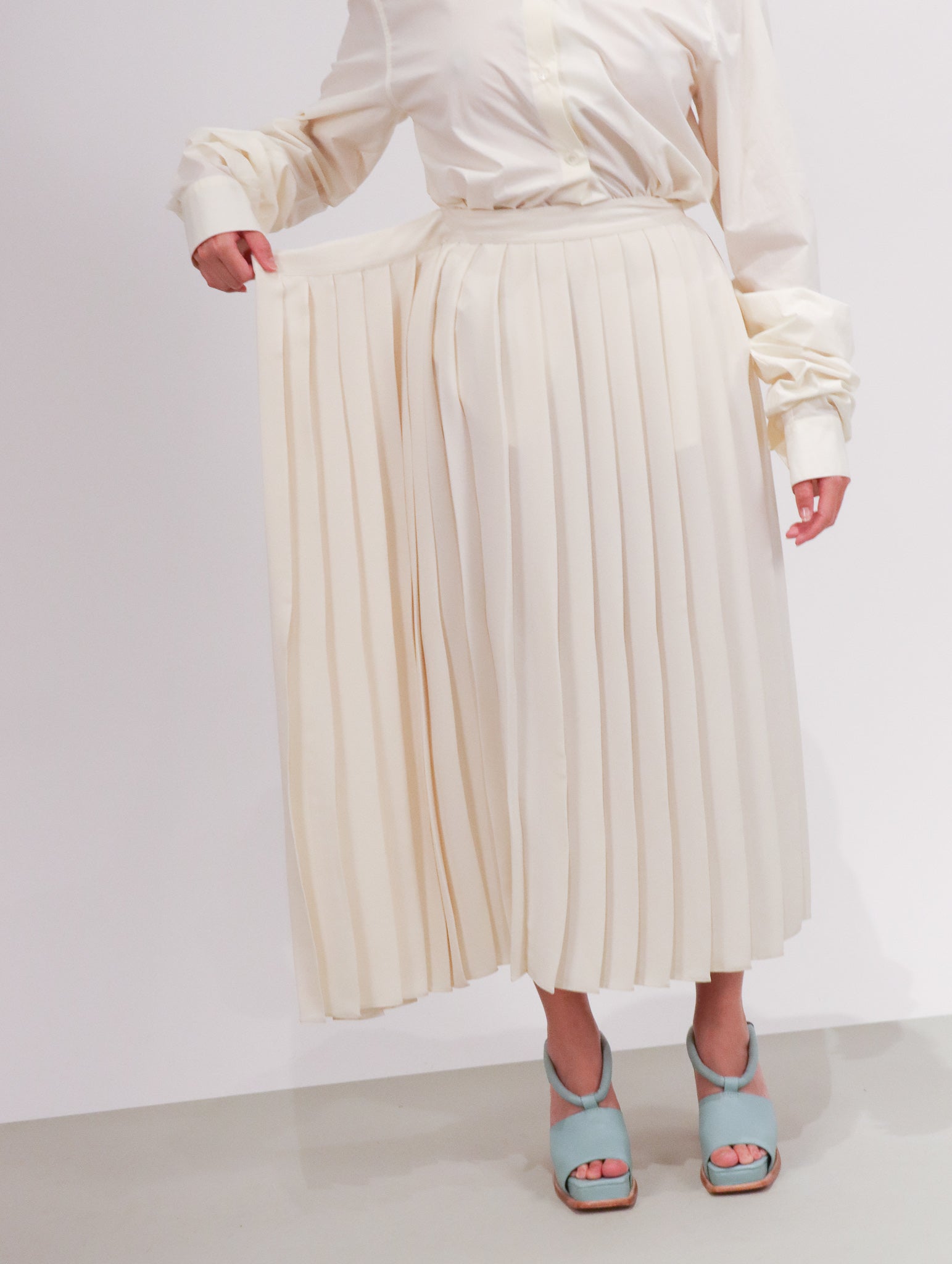 Maison Margiela Pleated Side Drape Midi Skirt in - Off White