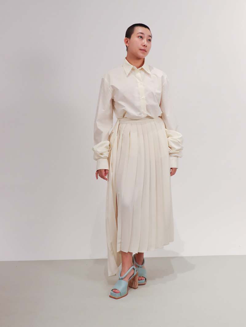 Maison Margiela Pleated Side Drape Midi Skirt in - Off White