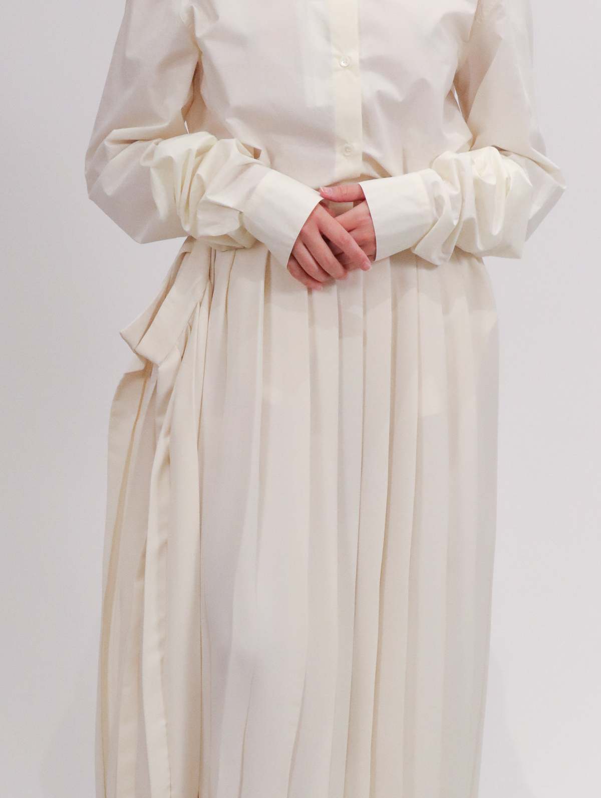 Maison Margiela Pleated Side Drape Midi Skirt in - Off White