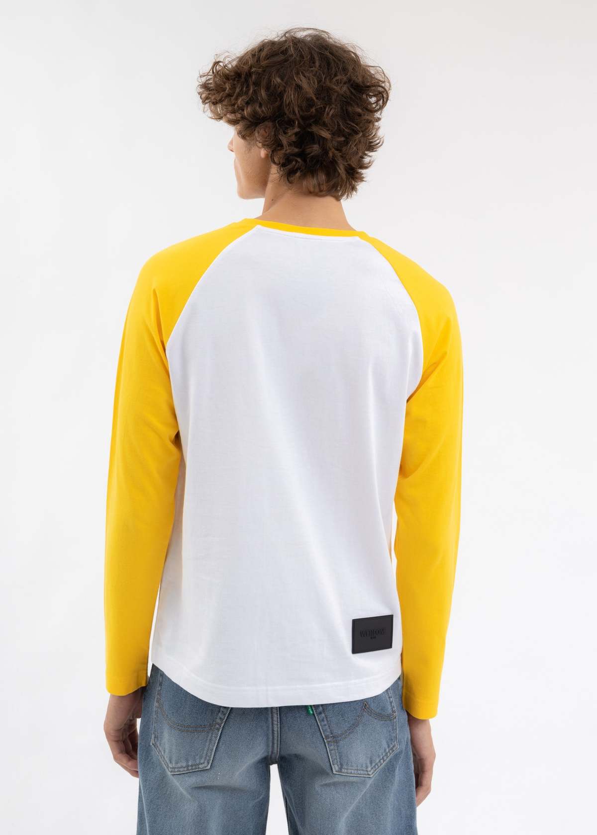 tight yellow long sleeve shirt