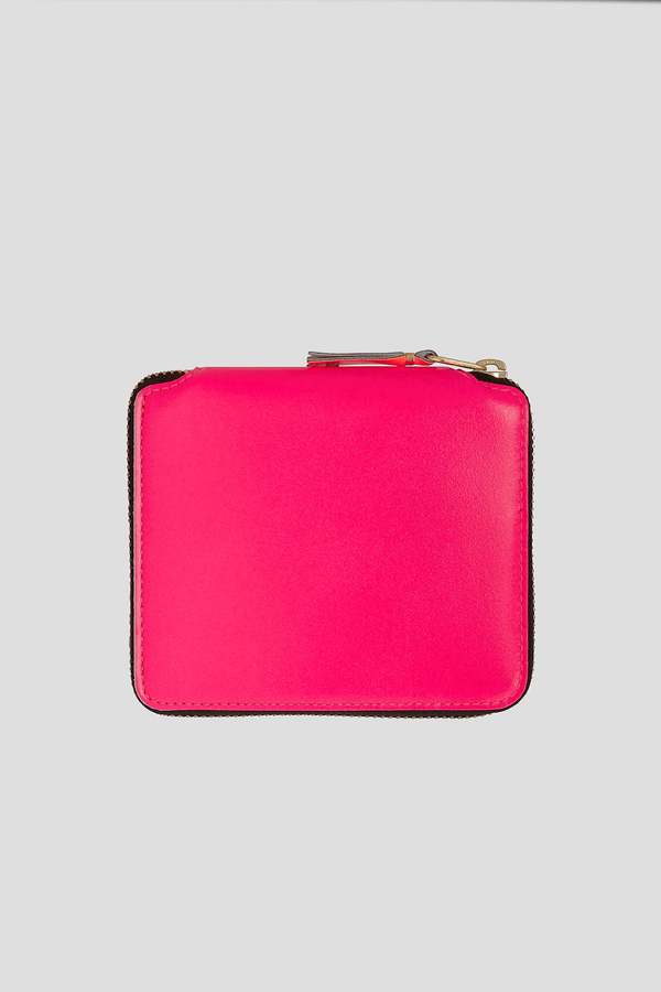 【COMME des GARCONS】 SUPER FLUO クラッチ 関税/送料込 Comme des Garçons Super Fluo Neon Zip-Around Wallet | Garmentory