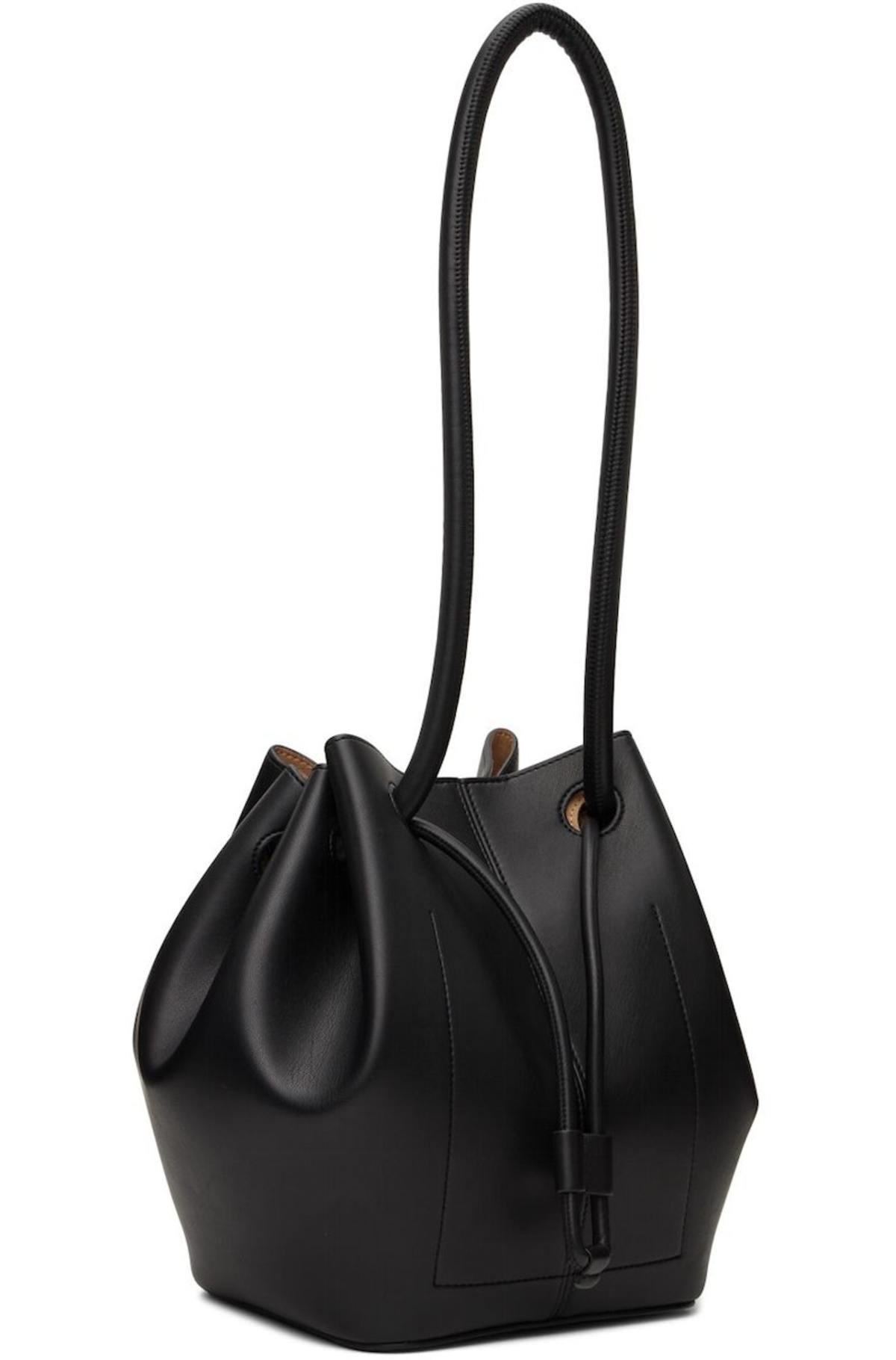 ★nanushka★ Medium Elongated Bucket Bag Black Tan NW22FWBG0 Nanushka Elongated Bucket Bag - Black | Garmentory
