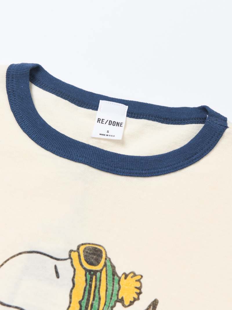 “RE DONE” Snoopy Ski Tシャツ VintageIvory RE/DONE RINGER SKIING SNOOPY TEE - VINTAGE IVORY/MIDNIGHT