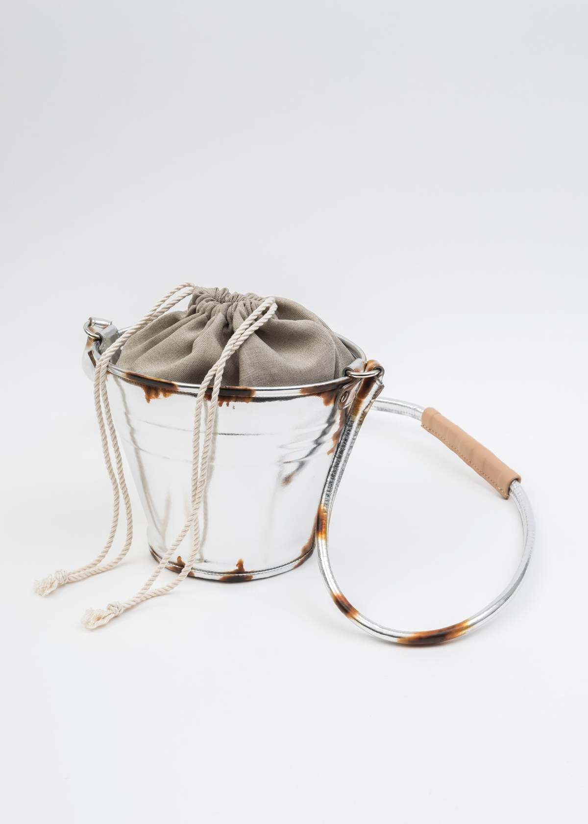 Doublet RUST PAINTED BUCKET BAG - SILVER | Garmentory