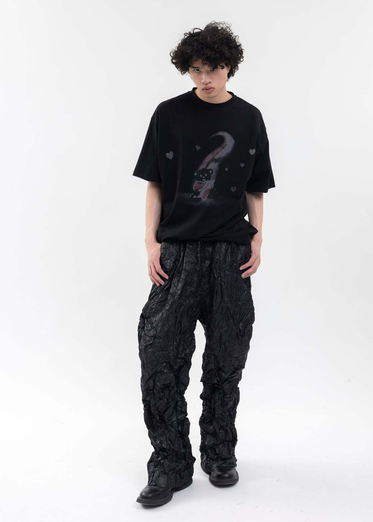 WE11DONE WASHED AND WRINKLED PANTS