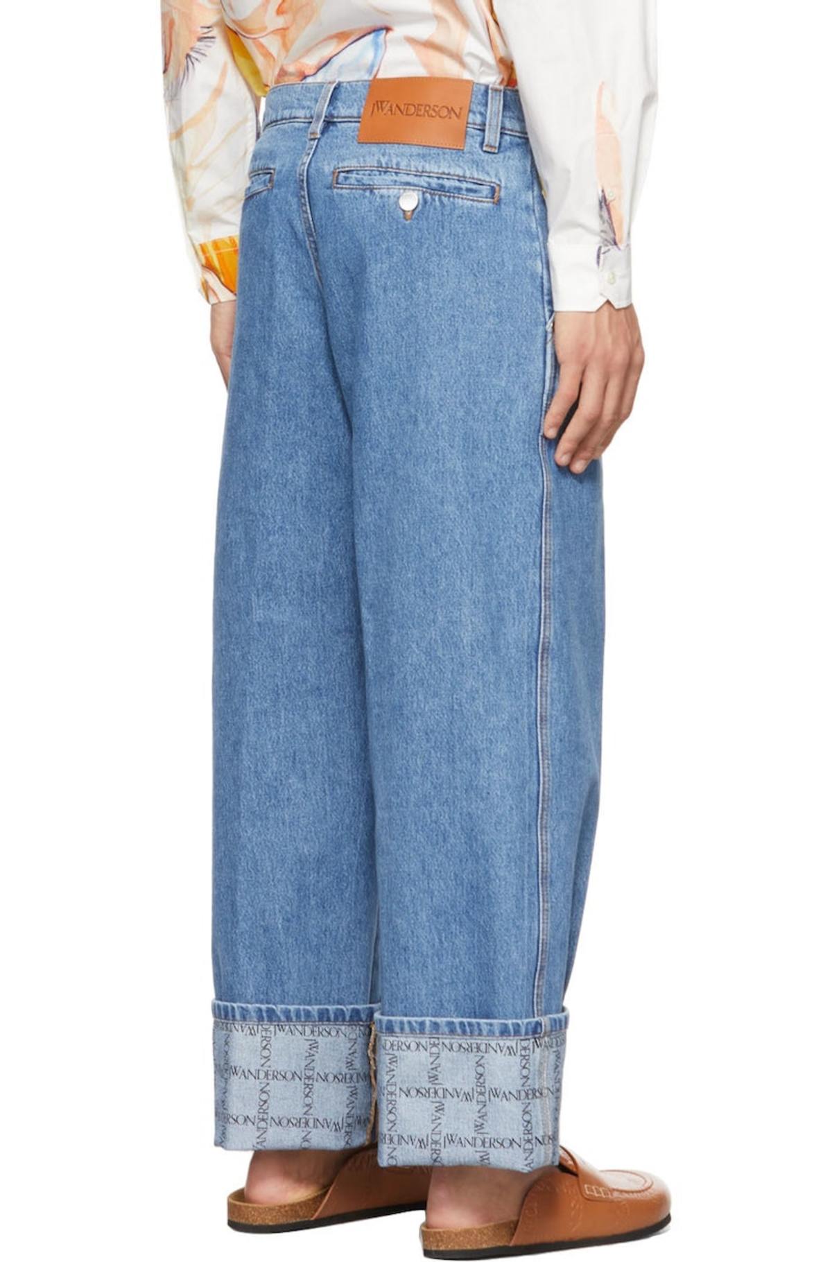 JW ANDERSON Logo Grid Cuff Jeans - Blue | Garmentory