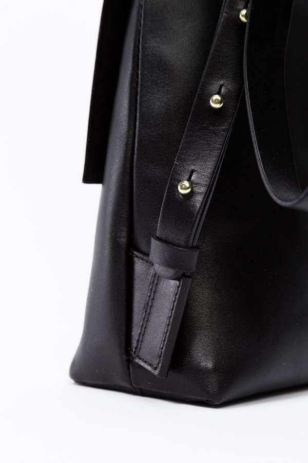 【BUILDING BLOCK】mini flat backpack Building Block Mini Rucksack in Black | Garmentory