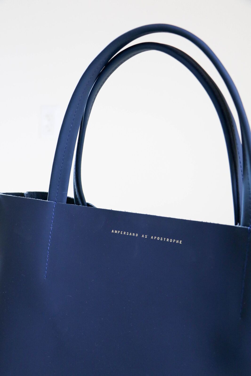 Ampersand as Apostrophe Stiff Sideways Tote in Matte Navy Garmentory