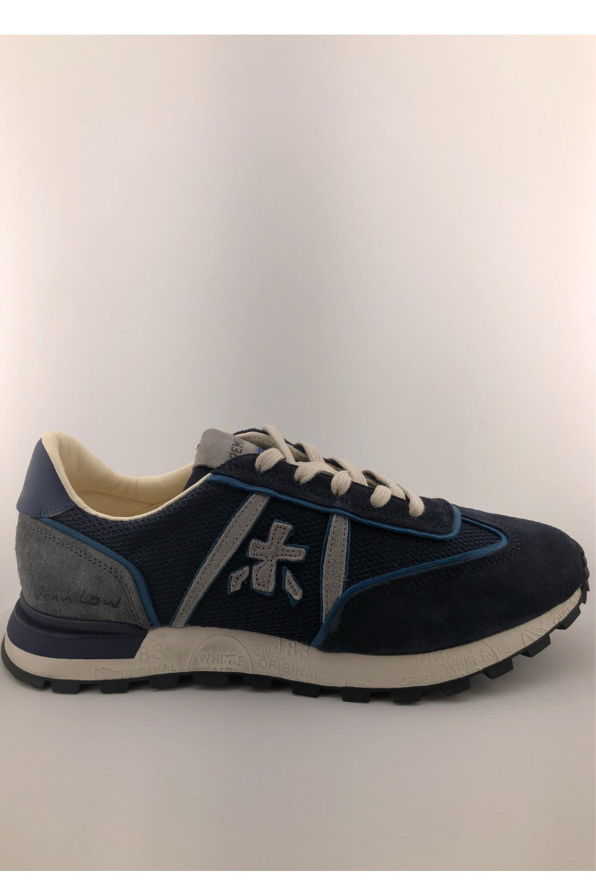premiata John Low 6476 | Garmentory