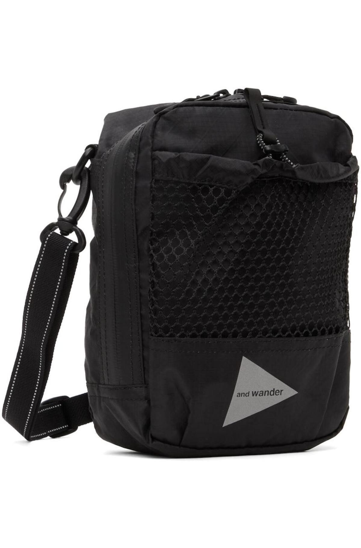 and wander Black Zip Messenger Bag | Garmentory